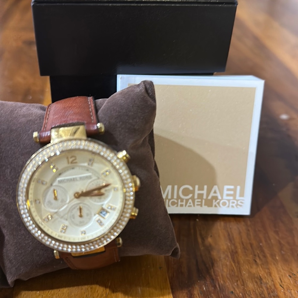 Michael kors gold with jewels and brown leather band